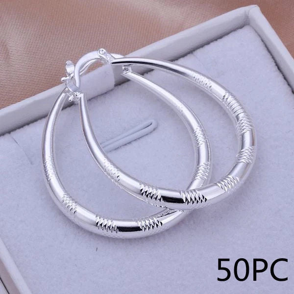 Silver-plated copper hoop earrings with 925 silver treatment, 3.9cm by 3.2cm