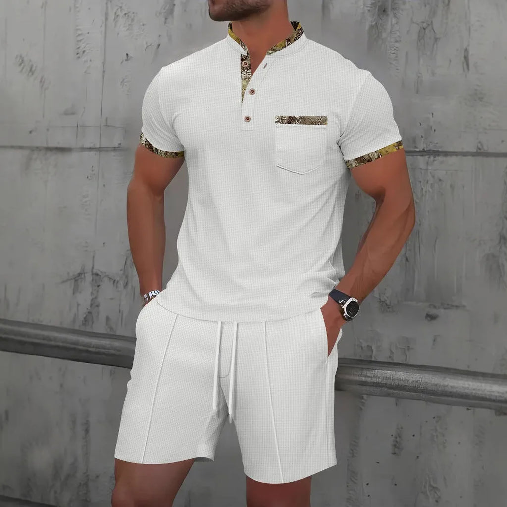 Man wearing a grey waffle-texture zip polo and matching shorts from a cotton blend summer suit set.