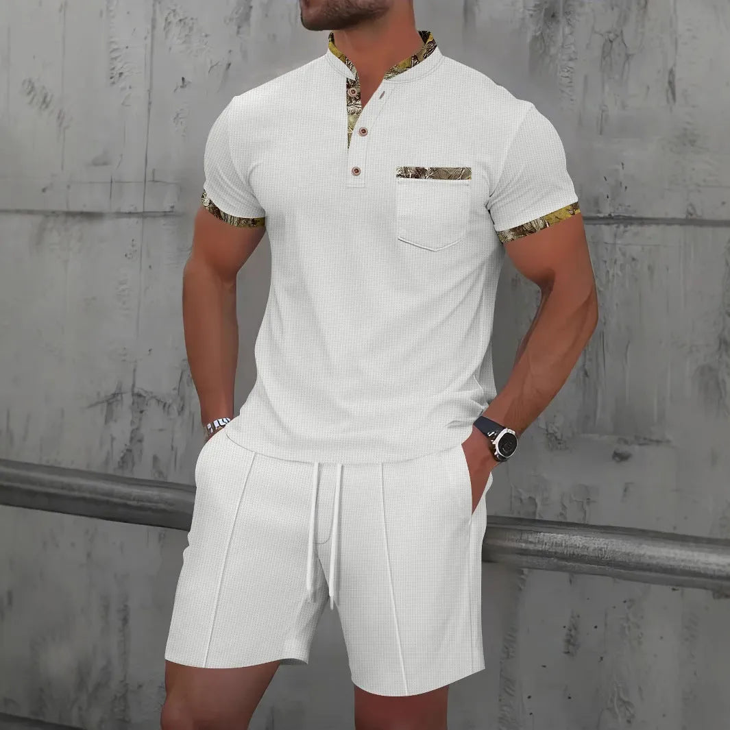 Man wearing a grey waffle-texture zip polo and matching shorts from a cotton blend summer suit set.
