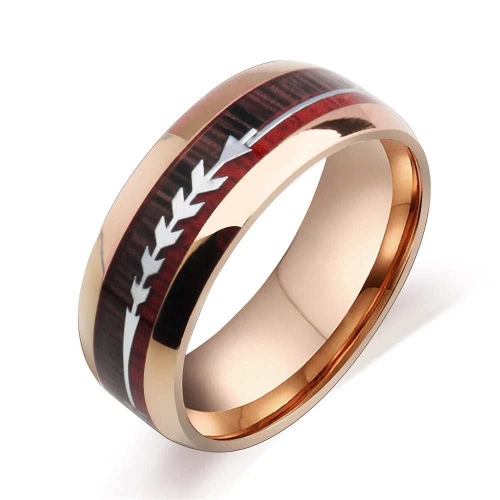 Men's stainless steel ring with wood grain arrow inlay in black, rose gold, and silver