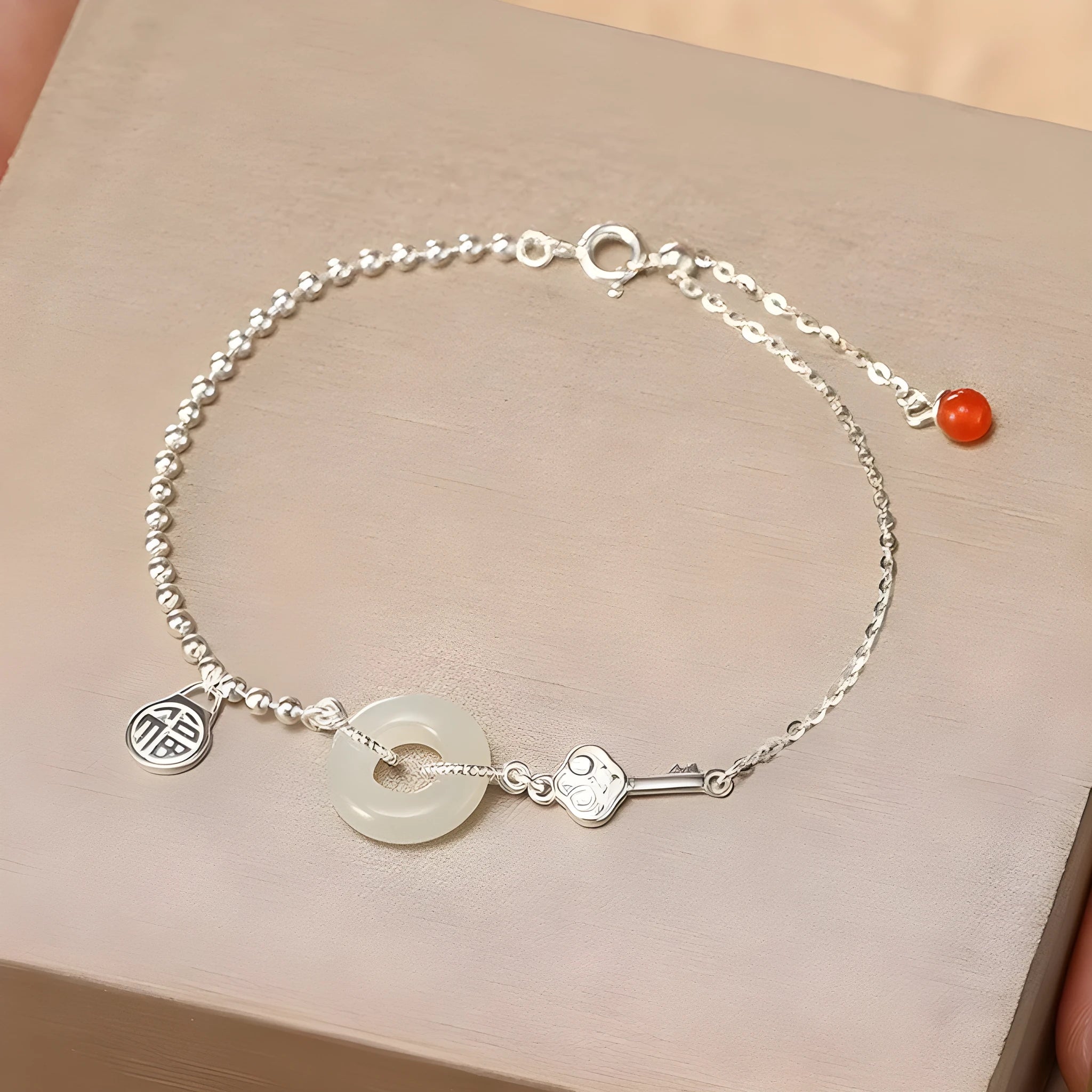 Women's Hetian jade bracelet in 925 silver with peace buckle charm, geometric Chinese style design