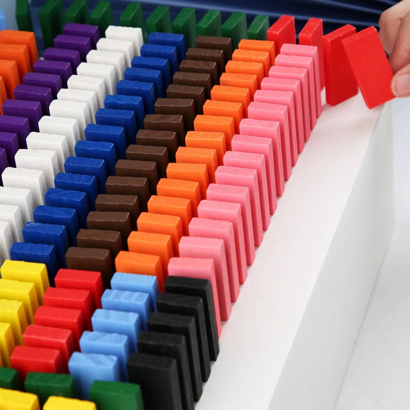 Wooden domino blocks set in 12 bright colours for educational play
