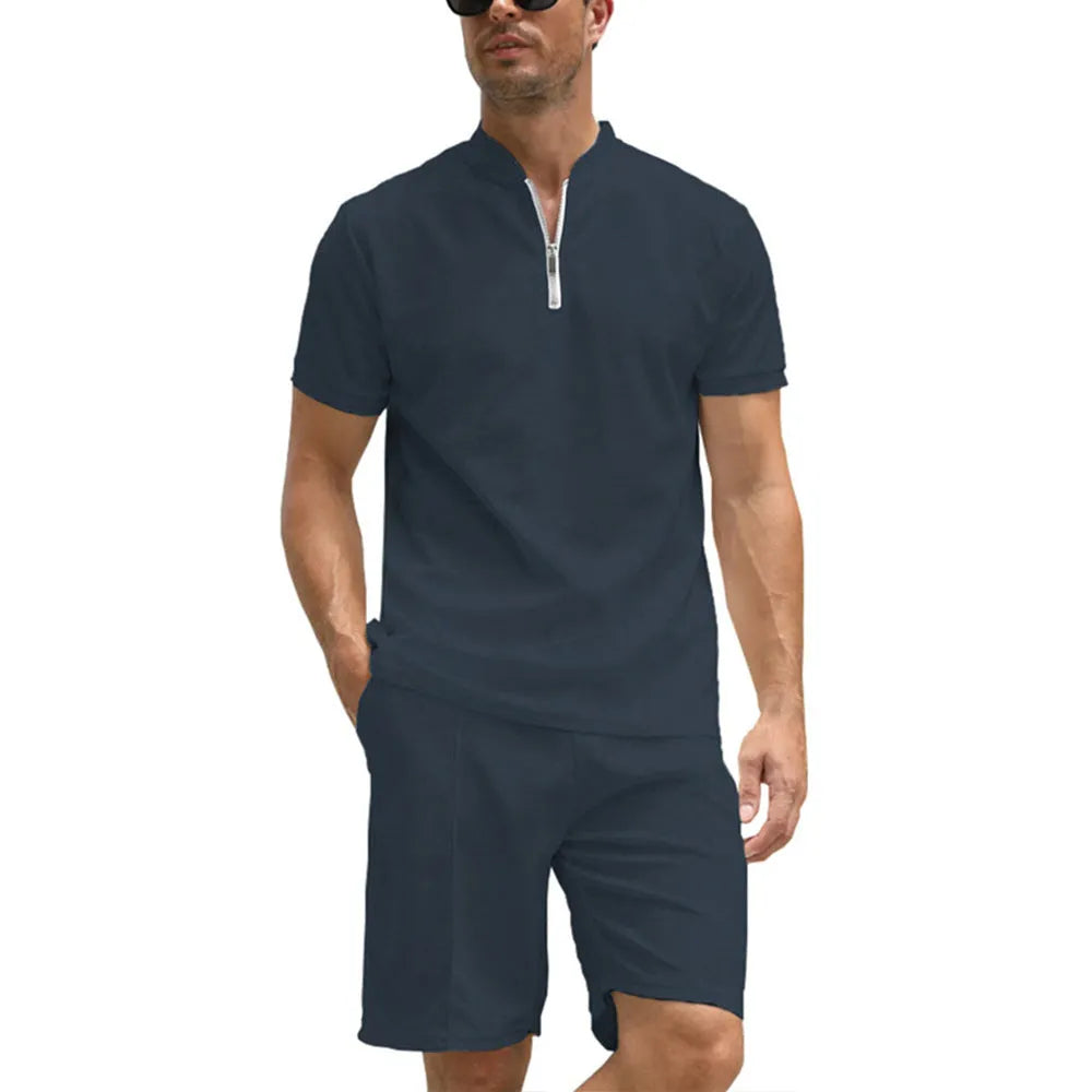 Men's solid colour polo shirt and trousers two-piece casual suit set on a hanger.