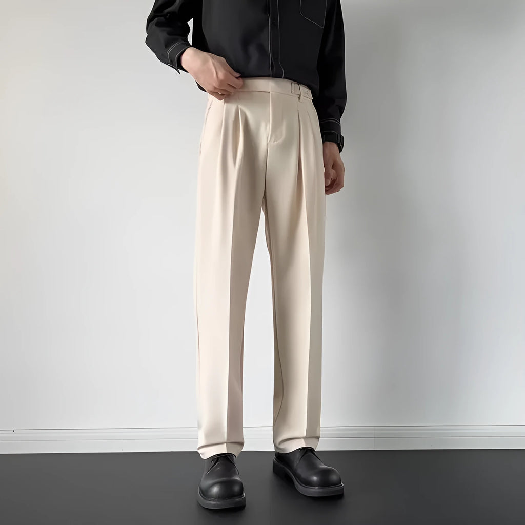 Men's straight-leg loose fit trousers in apricot colour on a hanger