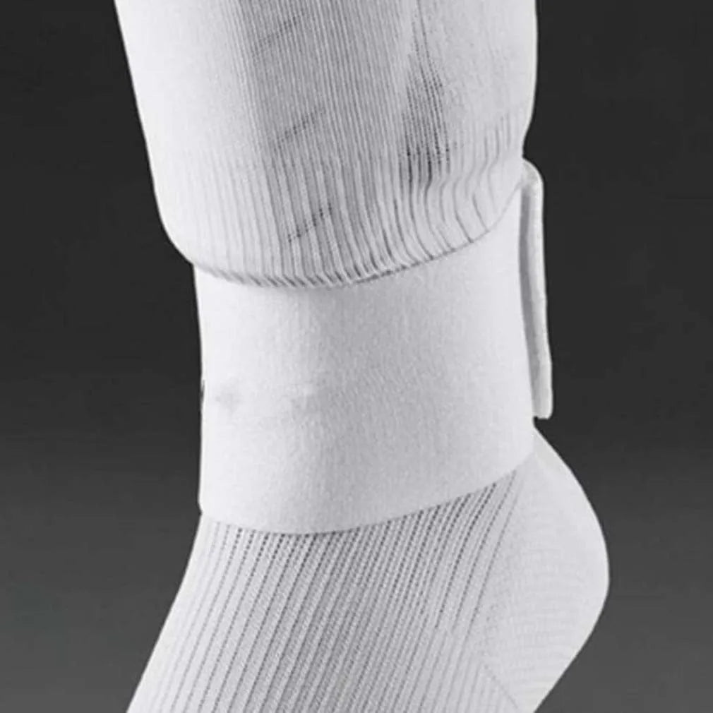 Red rubber elastic strap for securing football shin guards, shown flat to display its 250mm length.