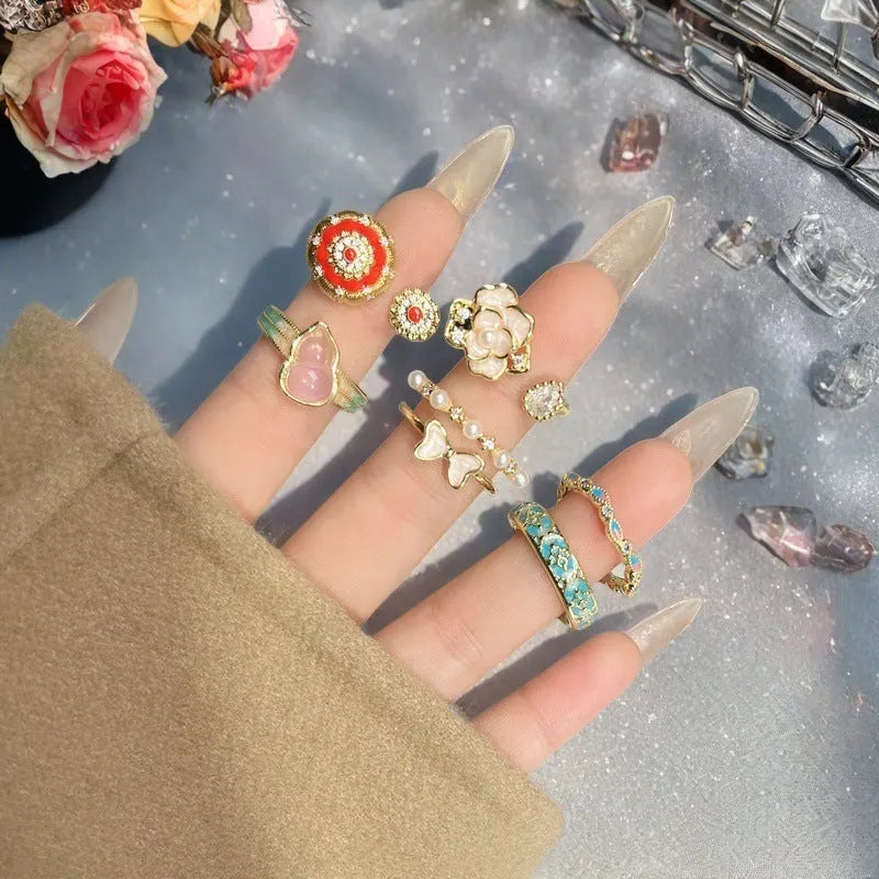 Adjustable copper ring with a vintage gourd, flower, and bow design in a new Chinese style.