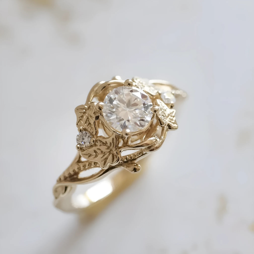 Gold alloy unisex ring with brushed finish on white background