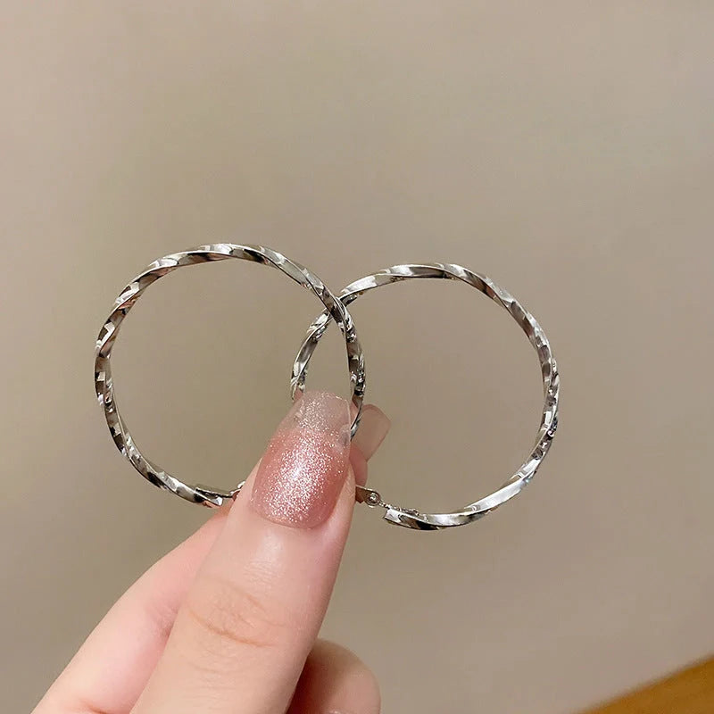 Geometric alloy earrings in gold and silver finishes