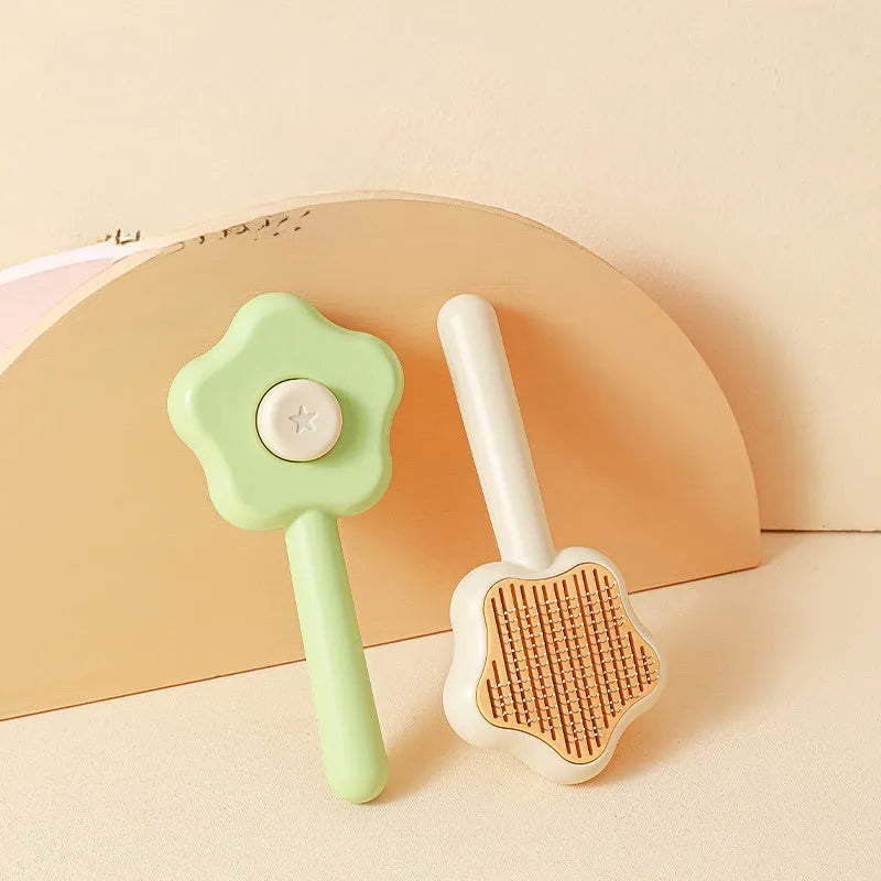 Green stainless steel cat grooming comb with four different needle surfaces for pet hair removal