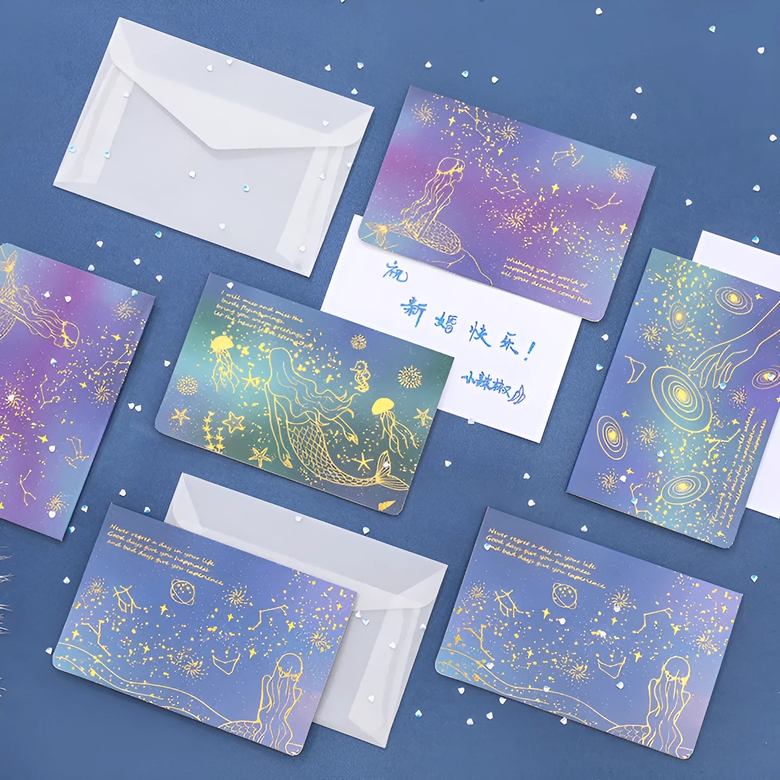 Set of three bronzed, pre-folded paper greeting card envelopes in one of four colour styles.