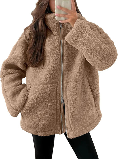 Stylish women's fleece zip-up jacket with pockets in various colours