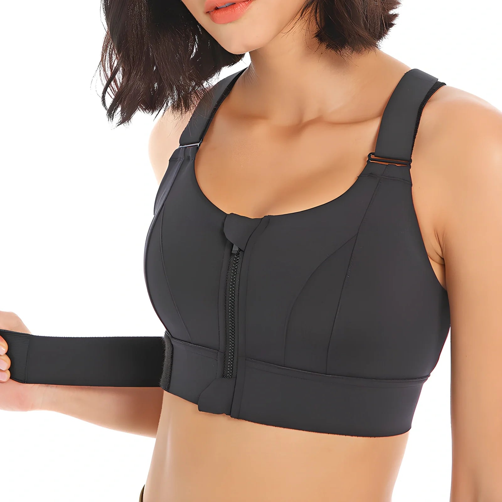 Women's black seamless sports bra with front zipper closure for high-impact workouts