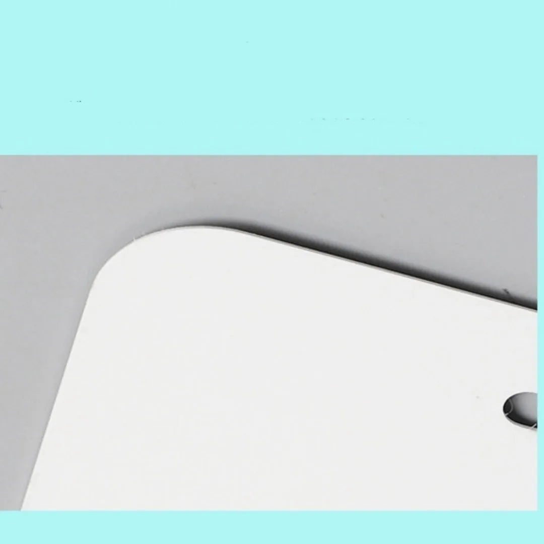 White aluminium licence plate blank sheet measuring 30.3 by 15 centimetres.