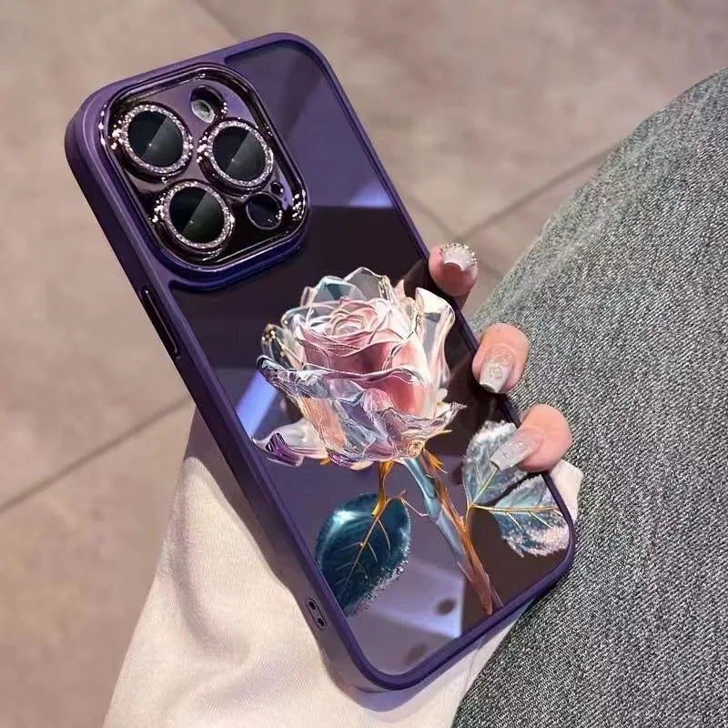 Dark purple fairy pink rose TPU iPhone case with sparkling pink lens film on an iPhone 14 Pro.