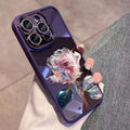 Dark purple fairy pink rose TPU iPhone case with sparkling pink lens film on an iPhone 14 Pro.