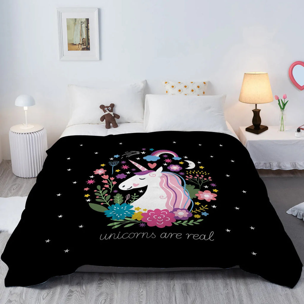 Soft flannel unicorn pattern blanket on black base, 75x100cm throw for sofa or outdoor use