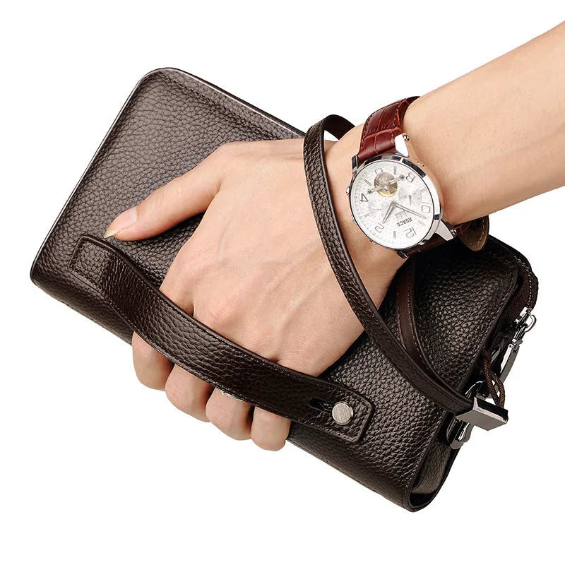 Men's black genuine leather wallet clutch open showing multiple card slots and compartments
