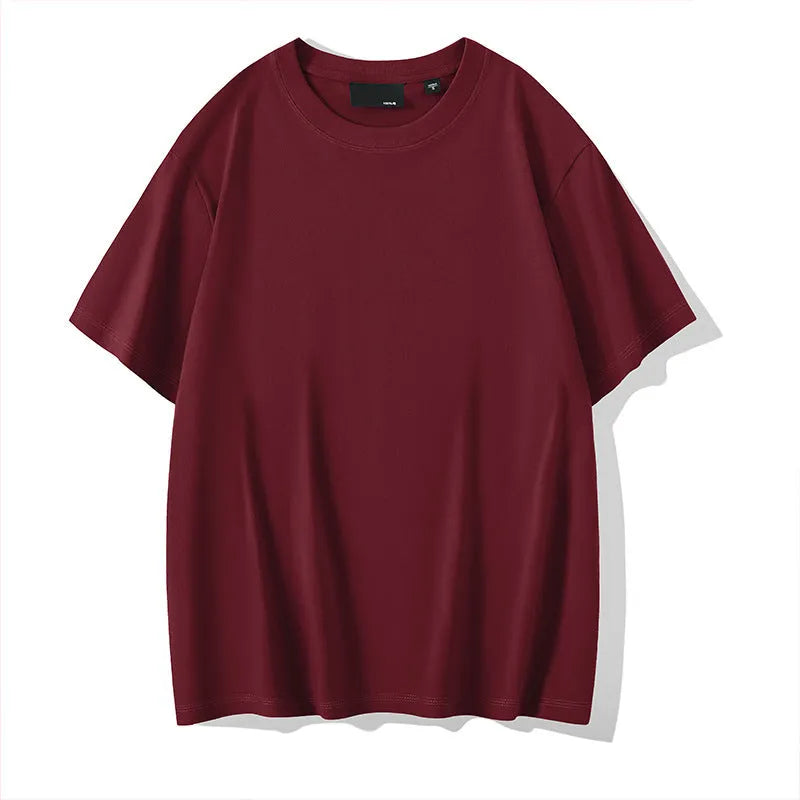 Men's solid colour cotton T-shirt with round neck and drop-shoulder sleeves