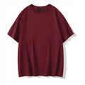 Men's solid colour cotton T-shirt with round neck and drop-shoulder sleeves