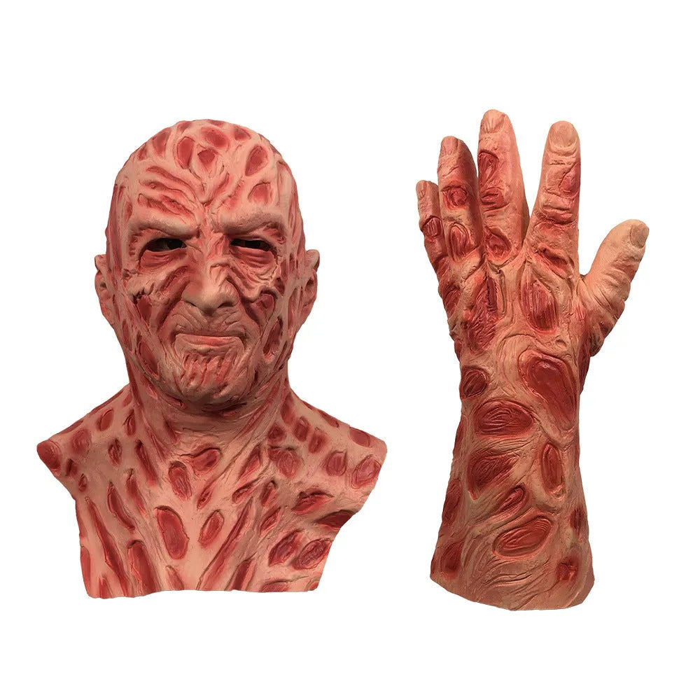 White latex horror grimace mask and gloves with Freddy Krueger styling on a dark surface