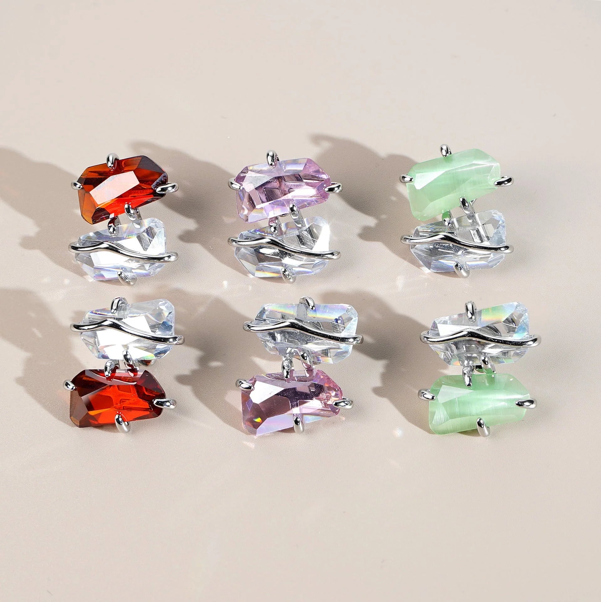 Women's Peach Blossom Spar Earrings in copper with zircon mosaic, available in pink, red, and green.