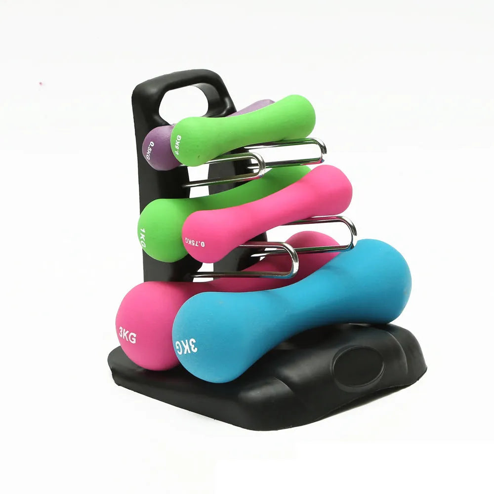 PVC freestanding dumbbell rack bracket holding multiple weights on a gym floor.