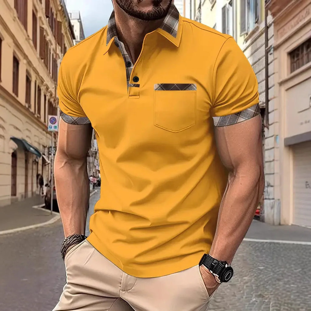 Man wearing a loose fit short sleeve t-shirt with a red and black plaid colourblock design.