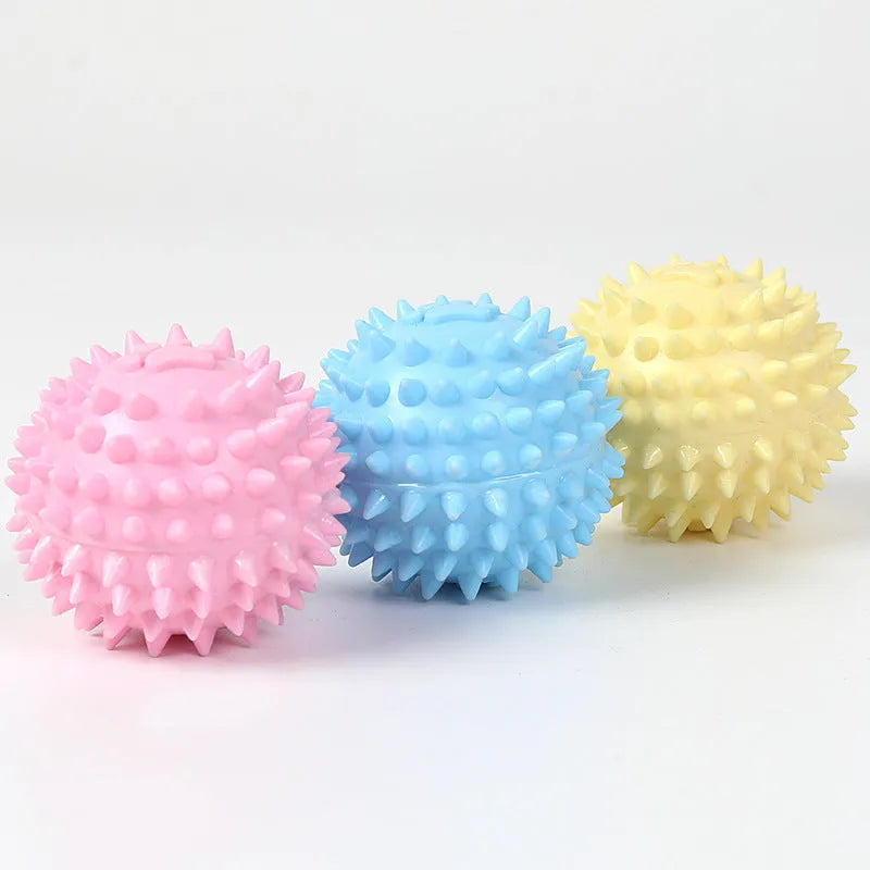 Blue TPR rubber pet chew ball with textured footprint design for teeth cleaning