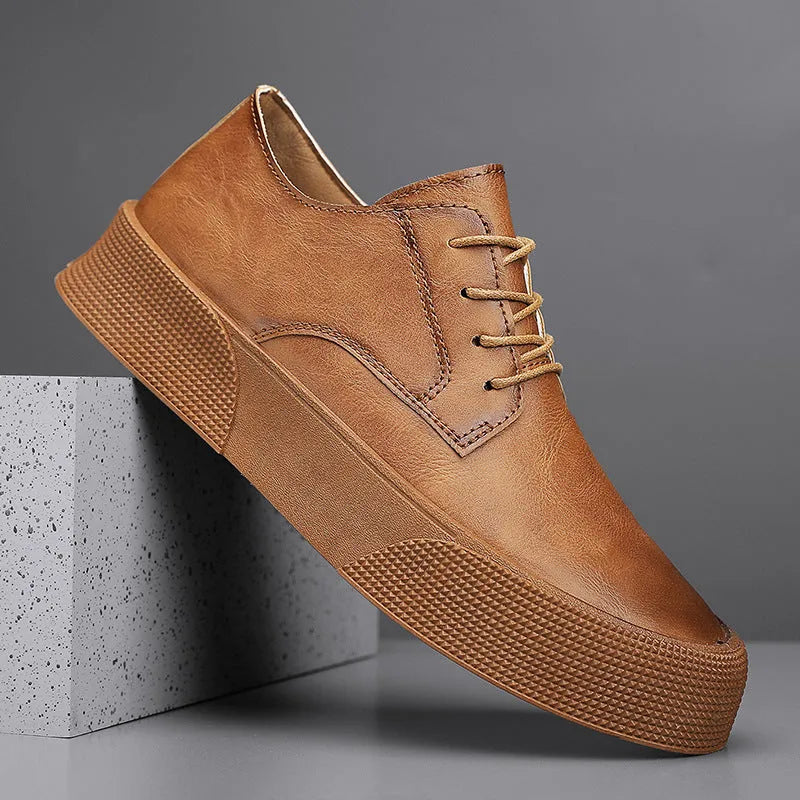 Men's lace-up platform board shoes in solid brown with round toe and low-top silhouette on a neutral background
