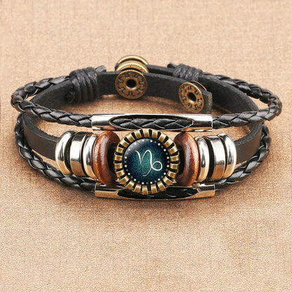 Multilayer leather bracelet with glass art depicting 12 zodiac signs, a stylish and captivating celestial accessory