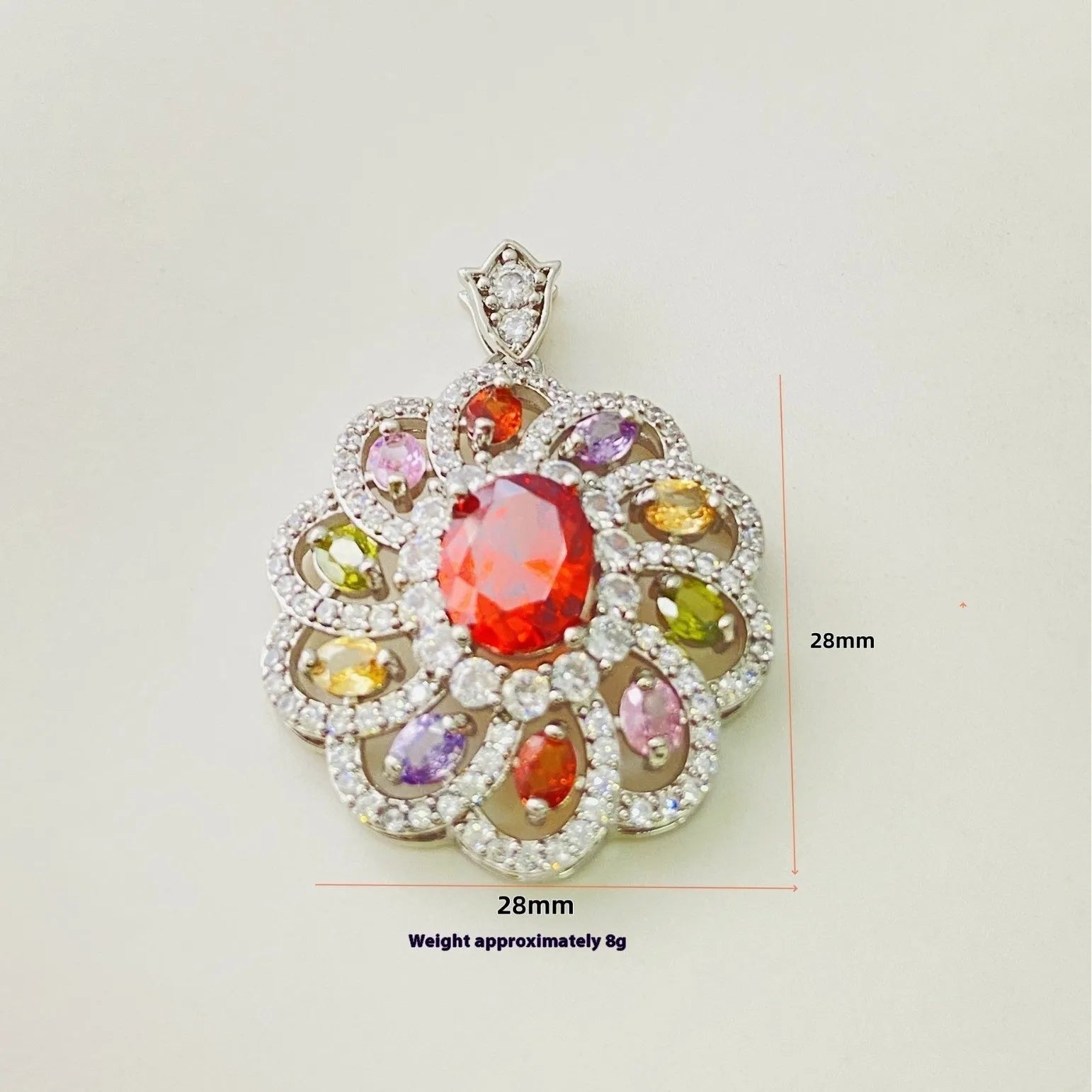Close-up of a women's flower-shaped zircon pendant necklace in a gold tone on a model.