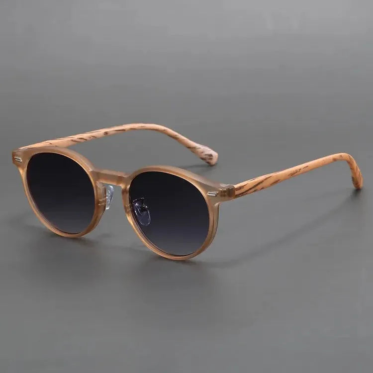 Retro style frosted round rim sunglasses shown in leopard print and grey colour options.