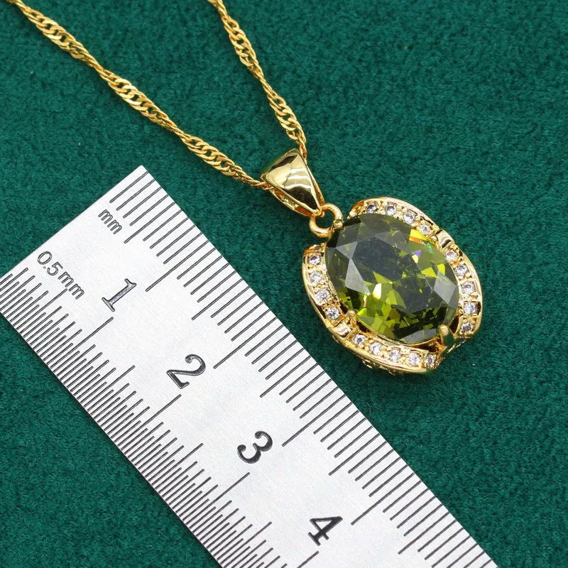 Olive green zircon jewellery suit for women featuring a snake bones chain necklace, matching earrings, and ring with a crown pattern.