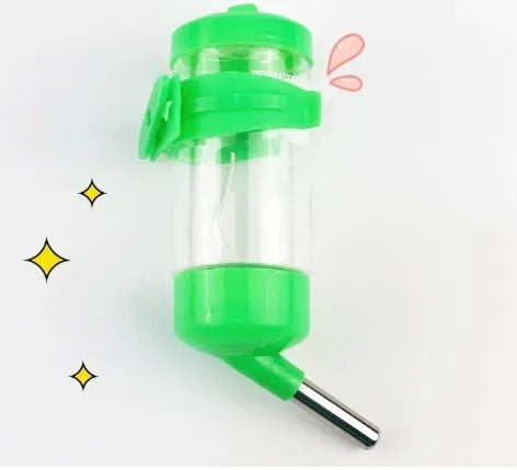 Plastic ball kettle leak-proof pet water feeder in green, showing its attachment to a bottle.