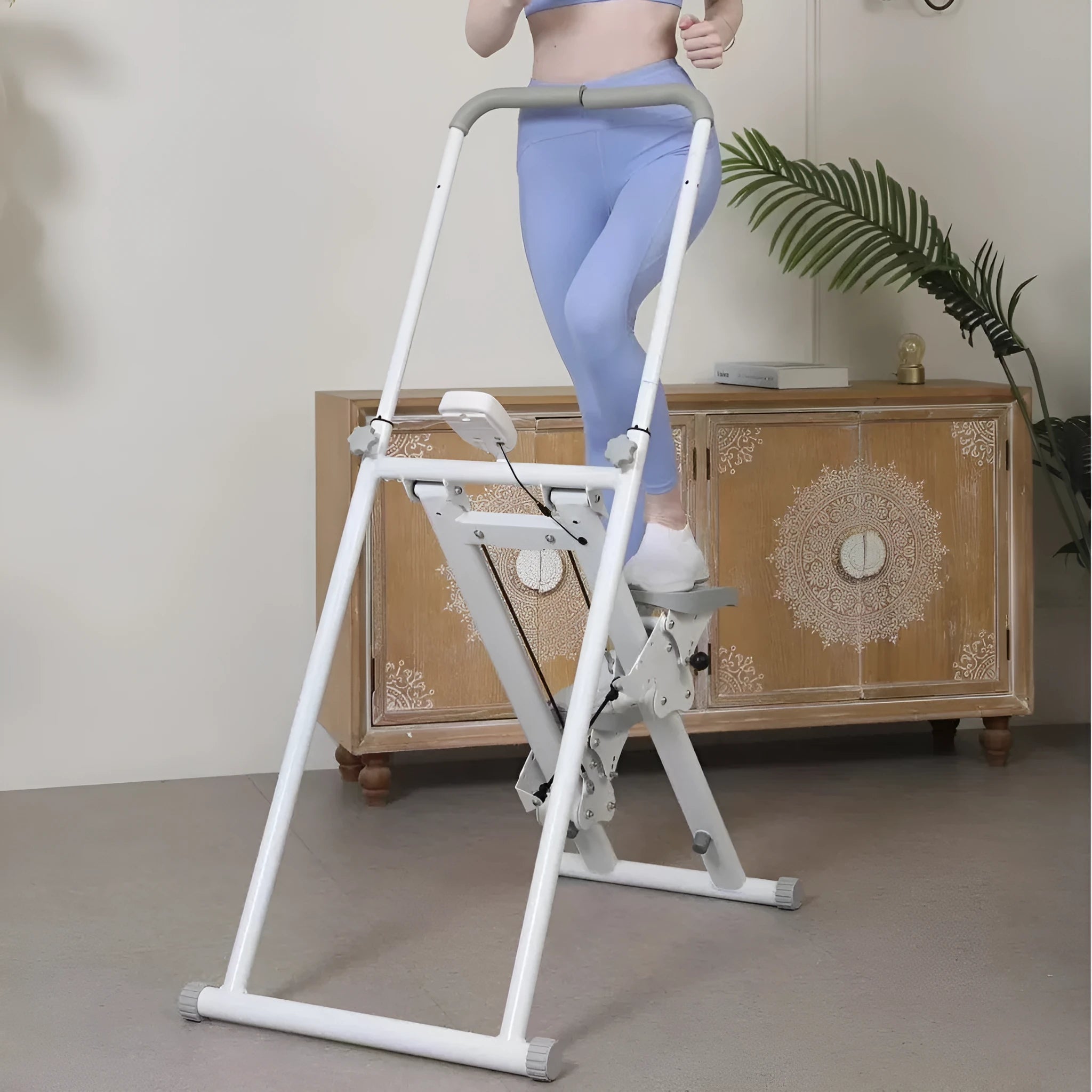 White foldable home fitness machine with integrated treadmill and climbing frame