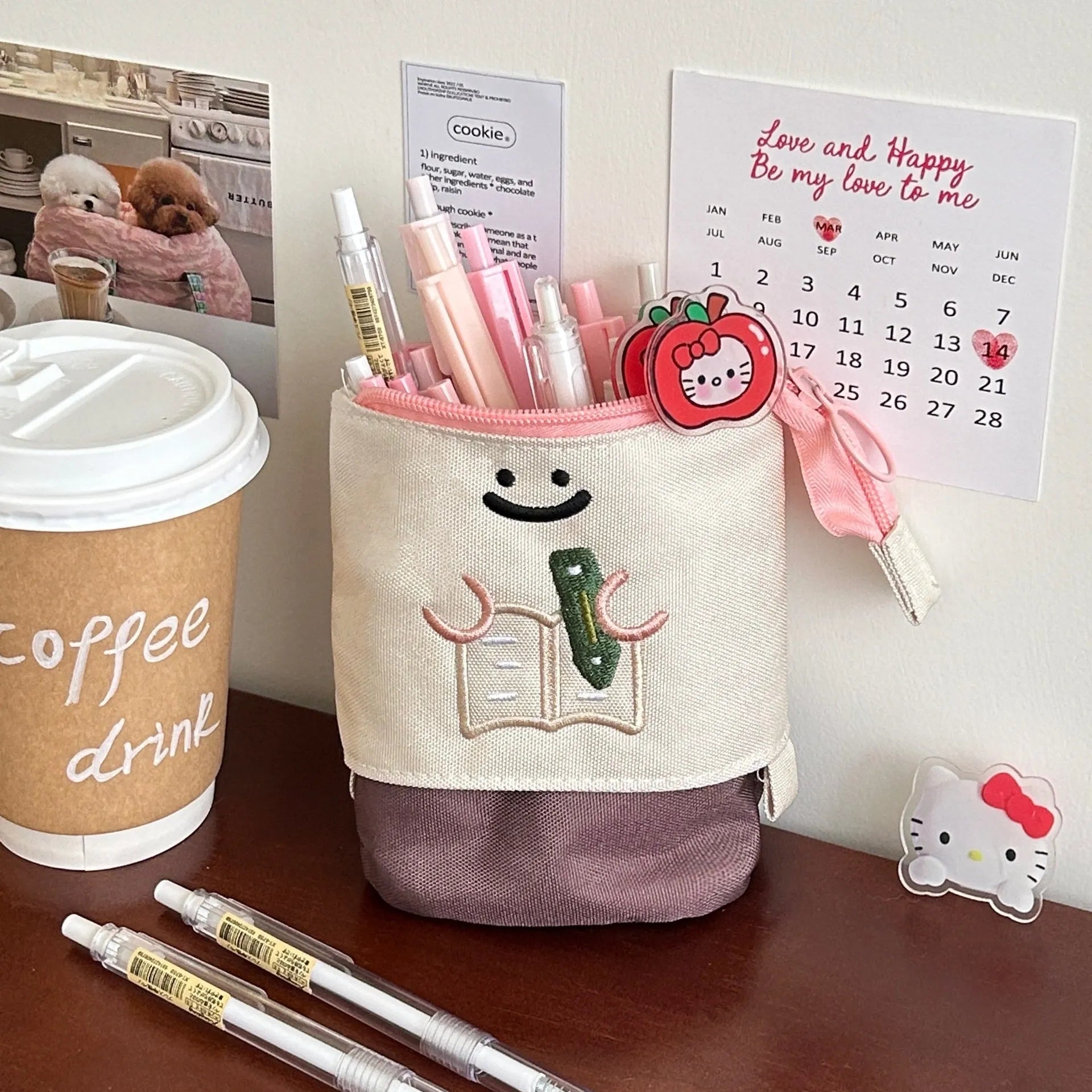 Brown collapsible Oxford fabric pencil case with large capacity, shown next to green version.