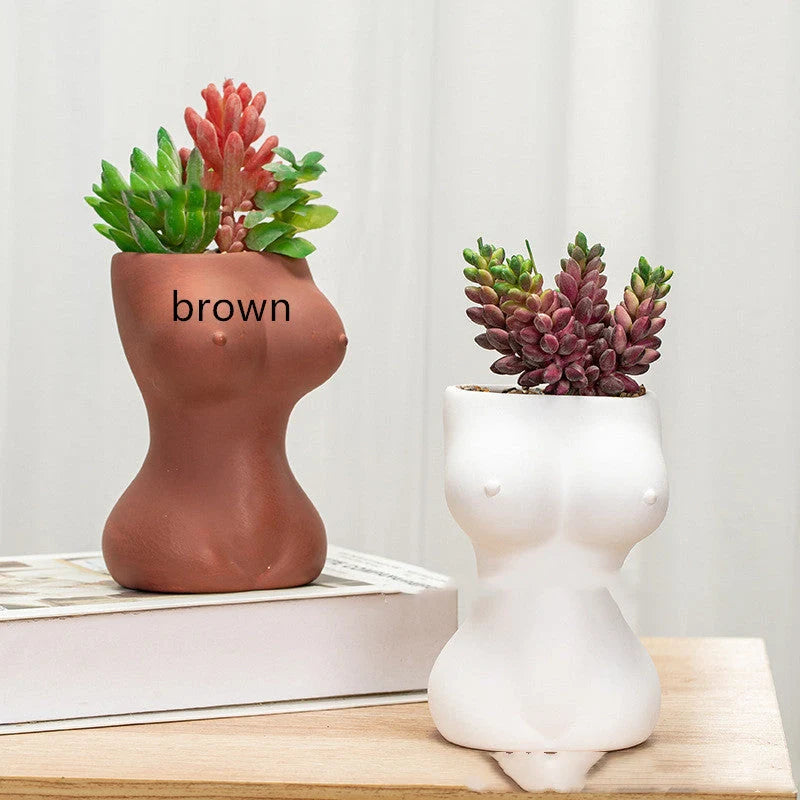European style ceramic flower pots with decorative figures and gods in white, pink, and brown
