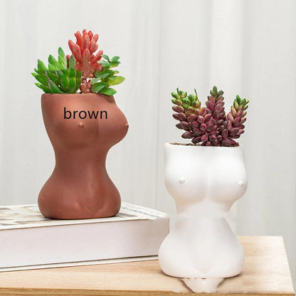 European style ceramic flower pots with decorative figures and gods in white, pink, and brown