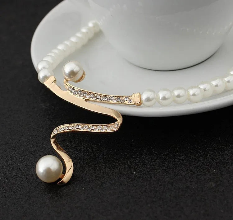 Gold electroplated pearl necklace and earrings set with deep V clavicle necklace design