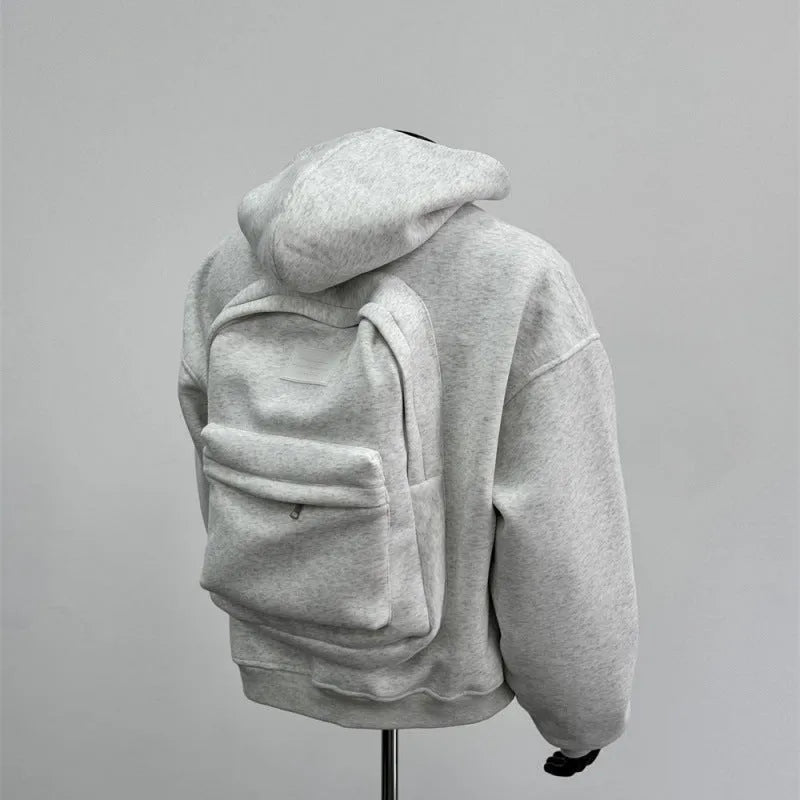 Men's grey hooded jacket with schoolbag-style back design showing front and back views