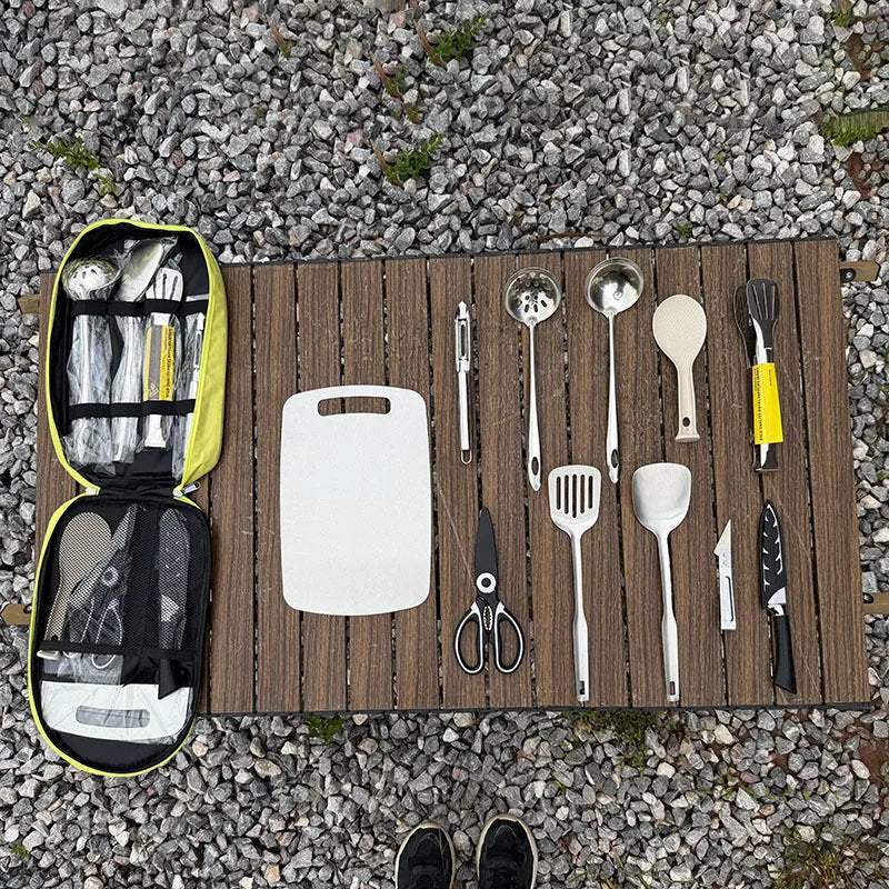 Brown portable storage bag containing a 12-piece stainless steel picnic kitchenware set.