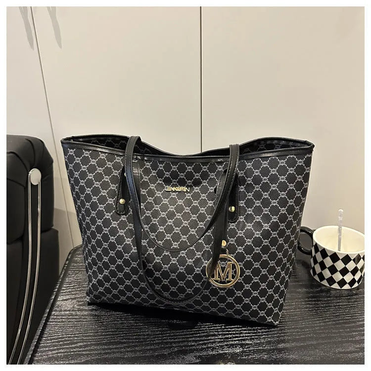 Western style black PU leather shoulder bag with sewing thread details and polyester lining.