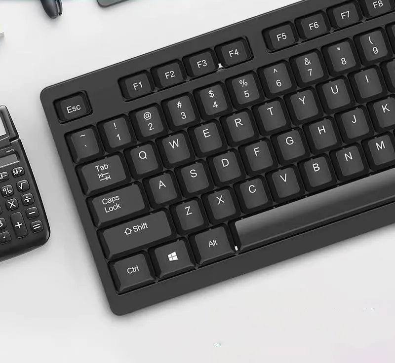 Black wired USB keyboard and mouse set KM160 with 1.5m cables on a desk