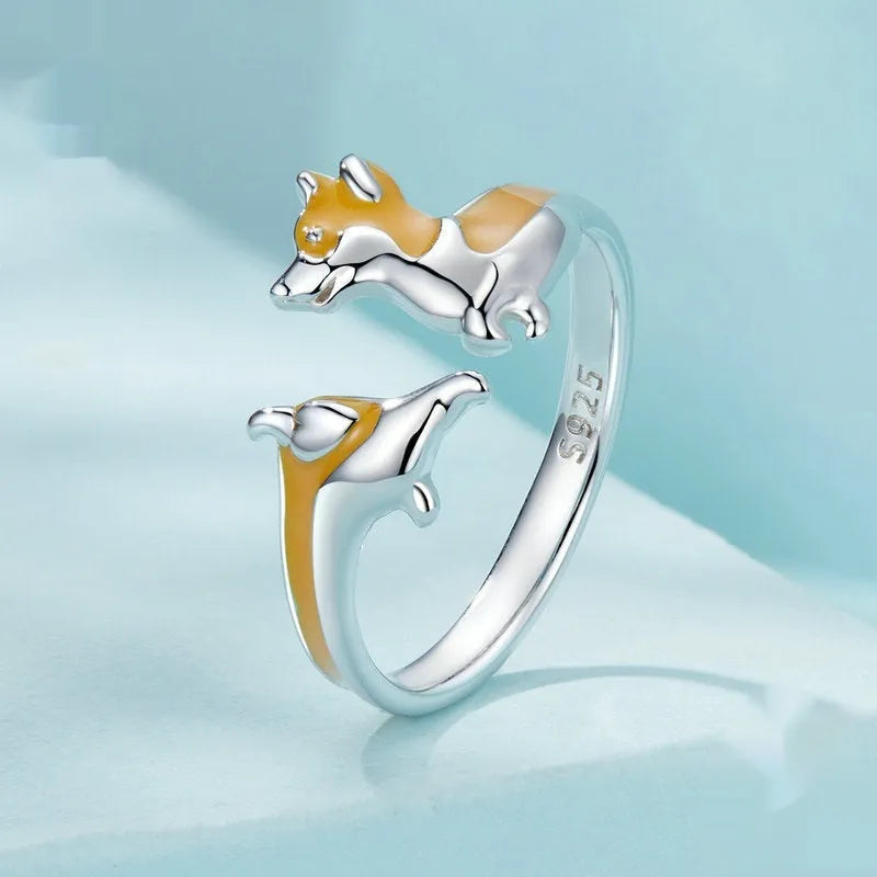 Cartoon corgi dog design on a silver plated women's ring.
