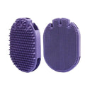 Purple pet grooming brush with soft silicone bristles and ergonomic TPR handle