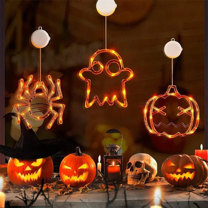 Spooky Halloween window hanging lights featuring pumpkins, spiders, and ghostly figures for a festive atmosphere