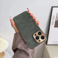 A solid-colour phone case with a leather texture, shown in grey, for an iPhone model.