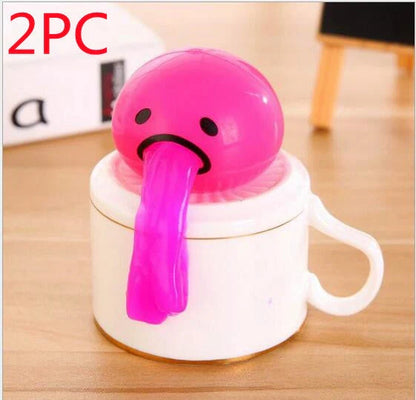 Gudetama Vomiting Egg Toy in green, orange, pink, and yellow