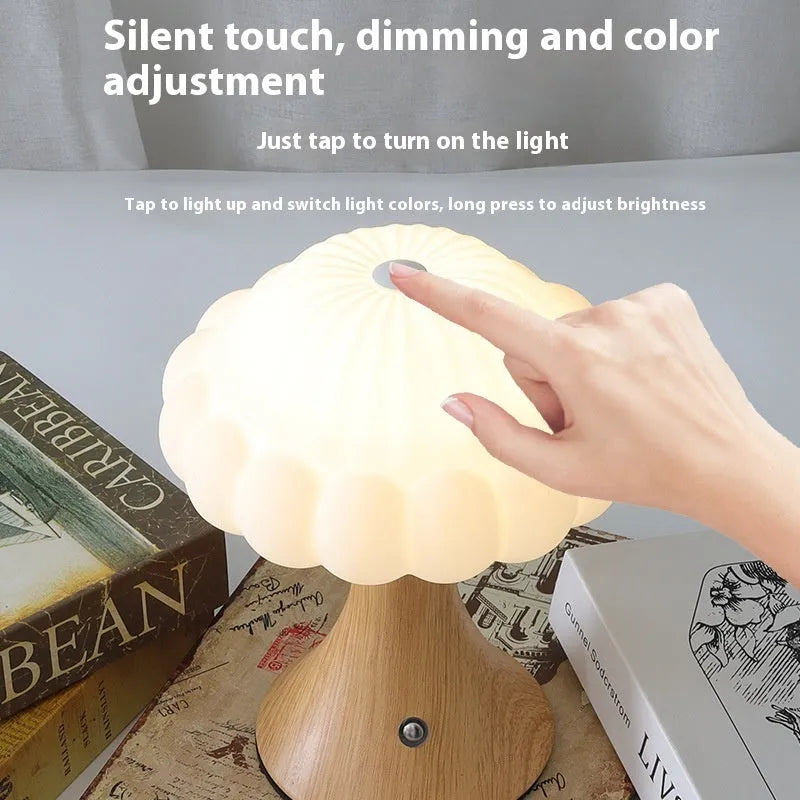 Wooden grain finish mushroom-shaped touch control night lamp on a table