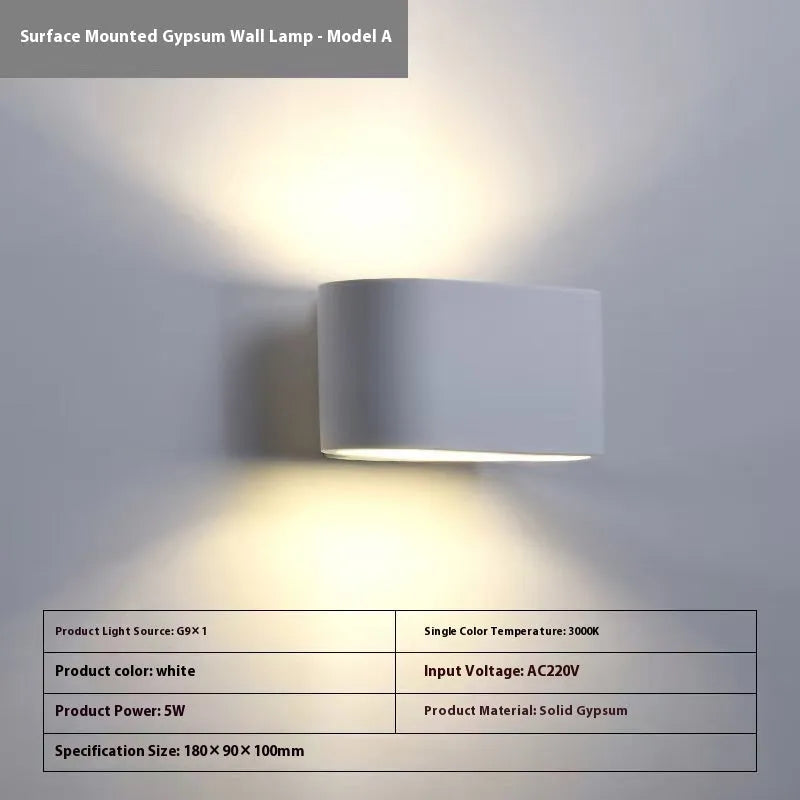 Simple Nordic plaster wall lamp with ABS shade mounted on a light-coloured wall